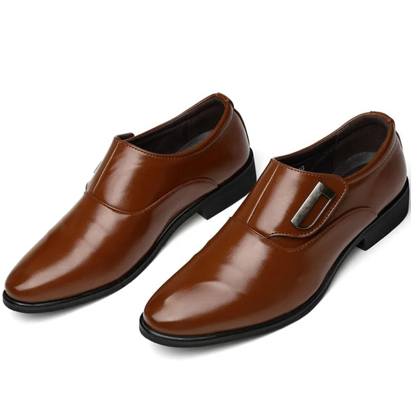 Pair of brown leather shoes on a white background