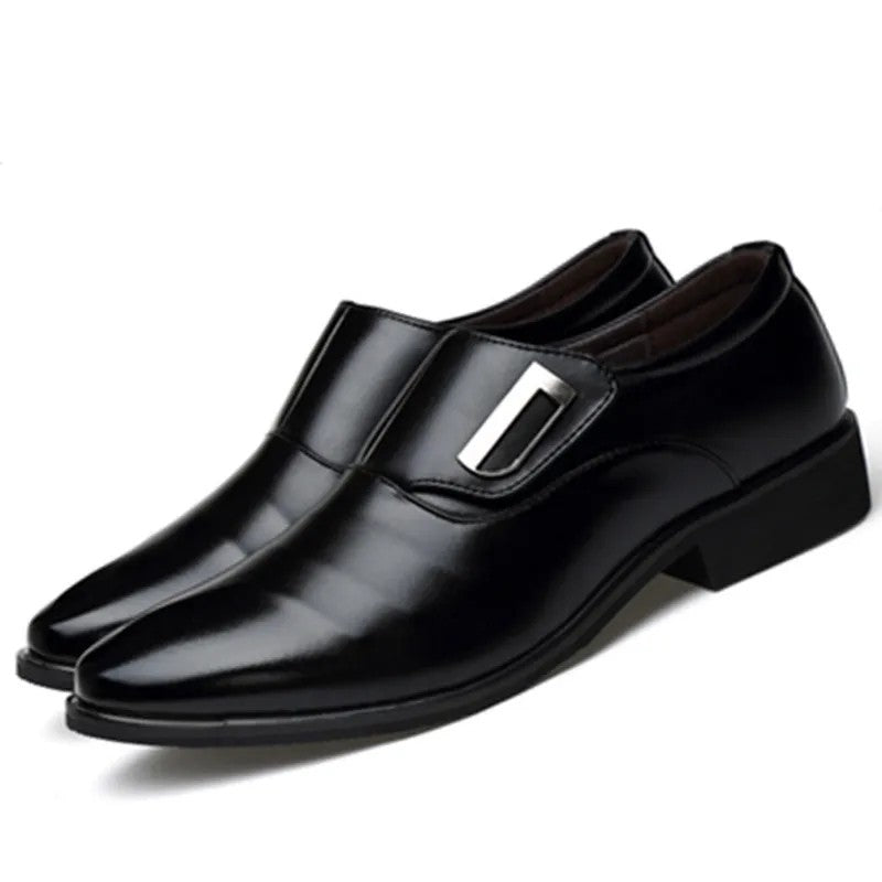 Black dress shoes with a shiny finish on a white background