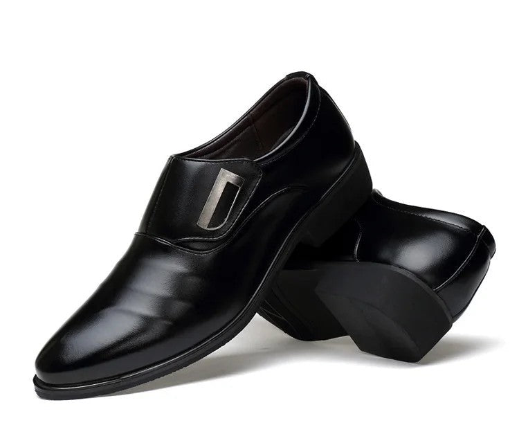 Black dress shoes on a white background