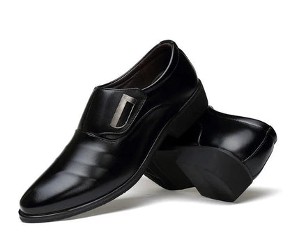 Black dress shoes on a white background