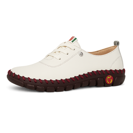 White shoe with red accents on a white background Frama Store 